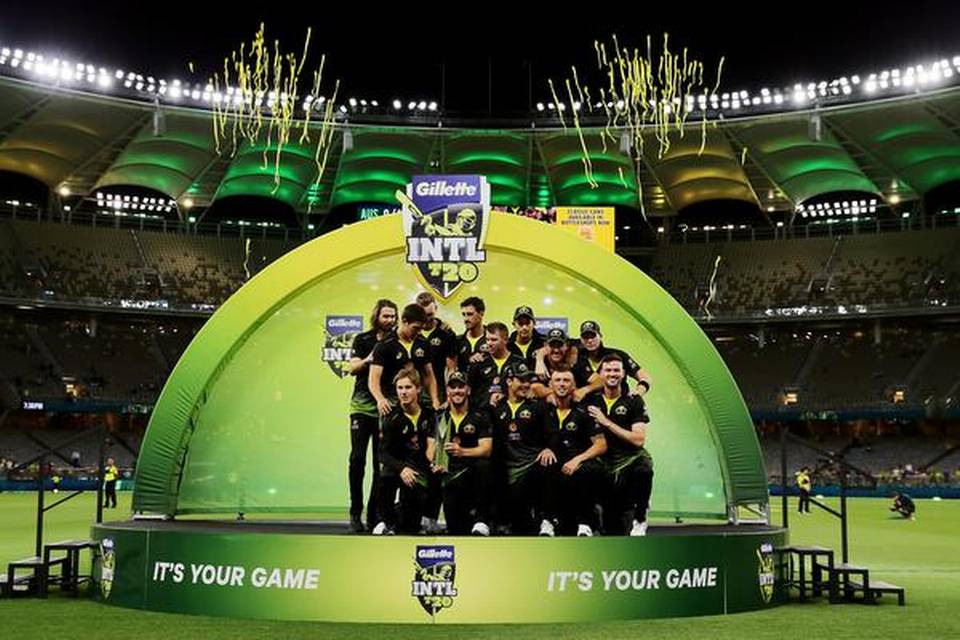 Australian cricket team celebrate after winning the T20 international series against Pakistan in Perth on November 8, 2019. 