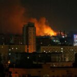 Russian forces launch missile strikes on Ukrainian cities; president defiant