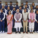 Prime Minister Narendra Modi with Union Minister of Youth Affairs and Sports Mansukh Mandaviya and Indian Olympic Association President PT Usha poses for a group photo with the Indian contingent heading for the upcoming Paris Olympics.
