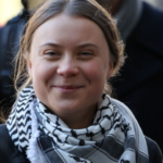 Greta Thunberg arrested in Copenhagen protest against Gaza war, wearing handcuffs and a keffiyeh shawl.